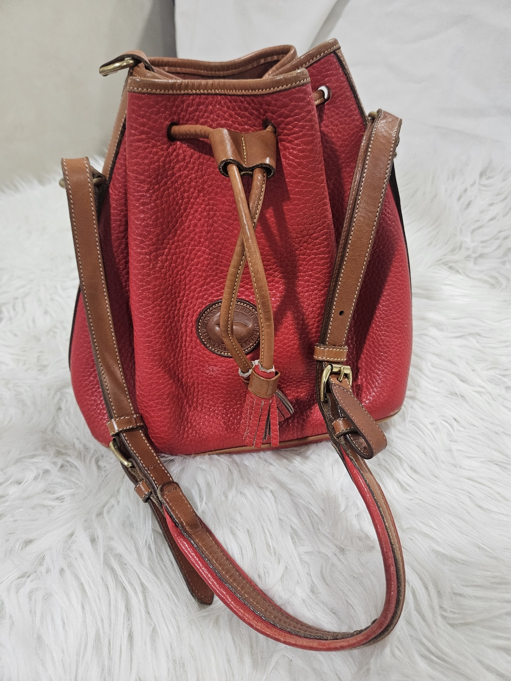 Red Leather Drawstring Bucket Bag with Brown Trim